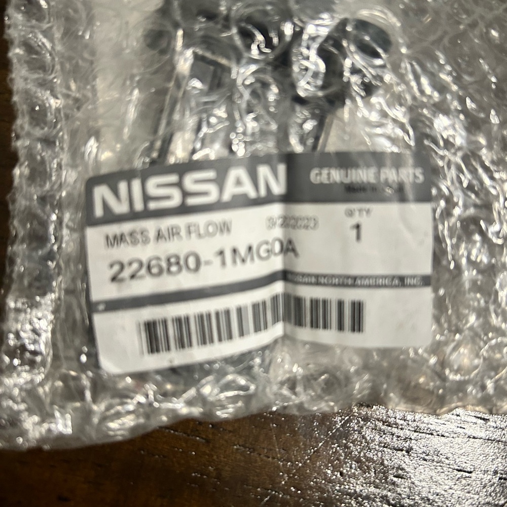 Nissan Genuine Parts Mass Air Flow Sensor - Black